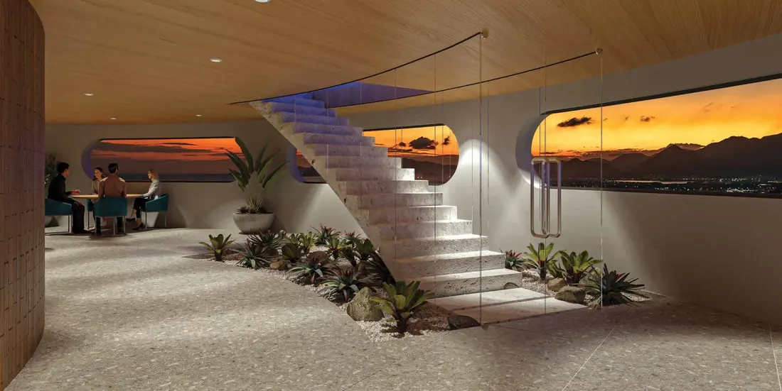 Escada e janelas curvas do Lounge Niemeyer no Niemeyer 360° Residences